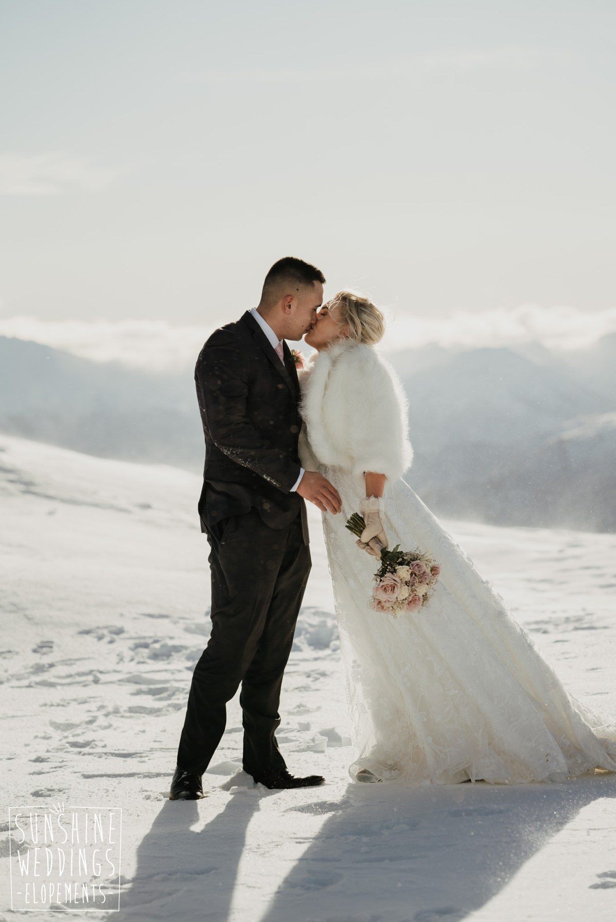 bride and groom winter wedding Queenstown